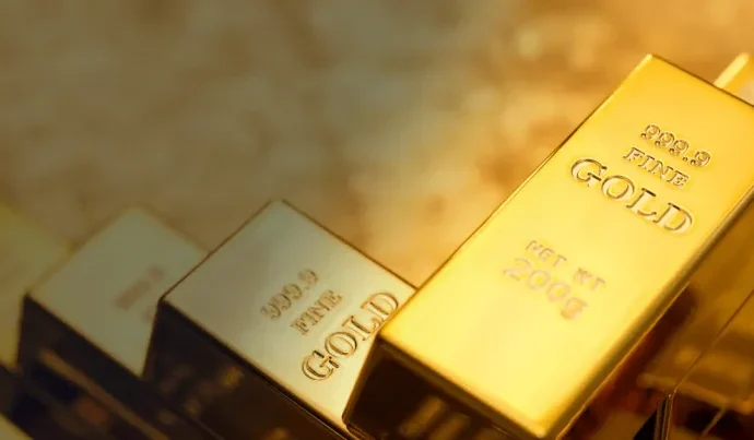 Ouro encerra sessão em leve queda após cancelamento de ataques dos EUA ao Irã