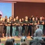 Grupo Vocal Artetude se apresenta na UFMS durante evento acadêmico